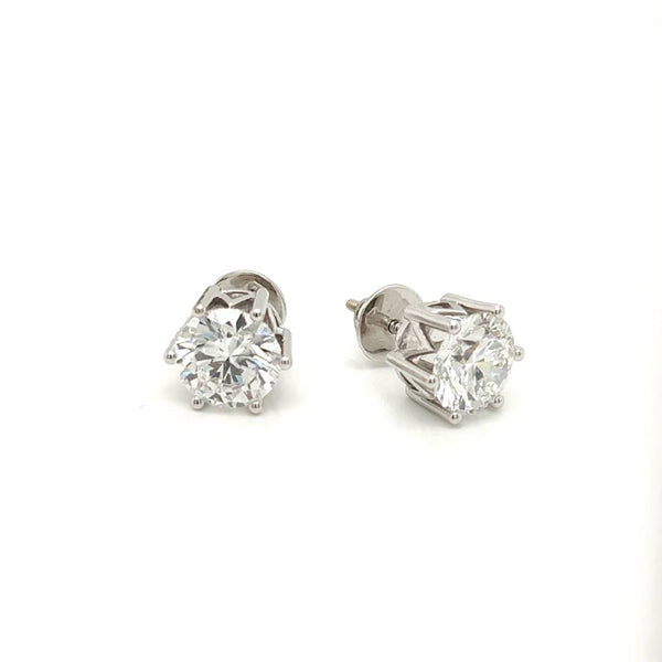 Lustrous Solitaire Studs Timeless Simplicity Meets Radiant Diamond Elegance.