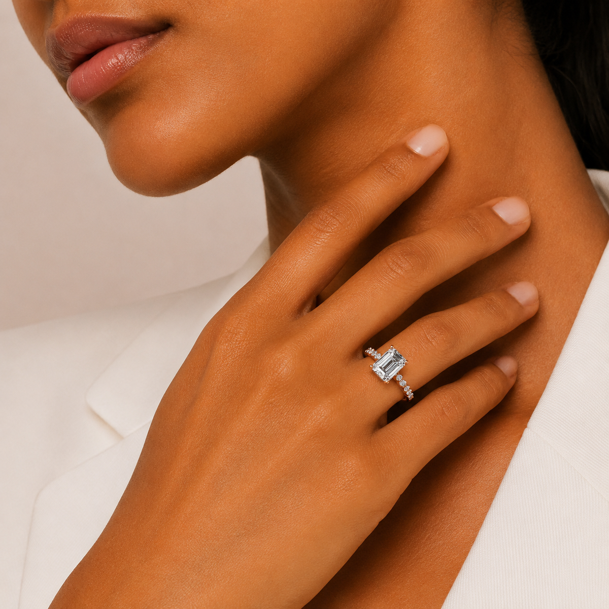 Engagement Ring Amour Emerald - Celebrating love with a touch of classic luxury — on-model view